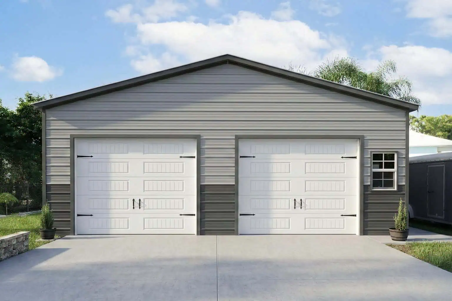 30x25x10 metal garage installed - 2-car-garage-residential