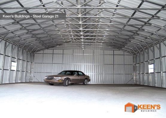 Wide Show Interior Of Steel Garage With A Sedan For Scale